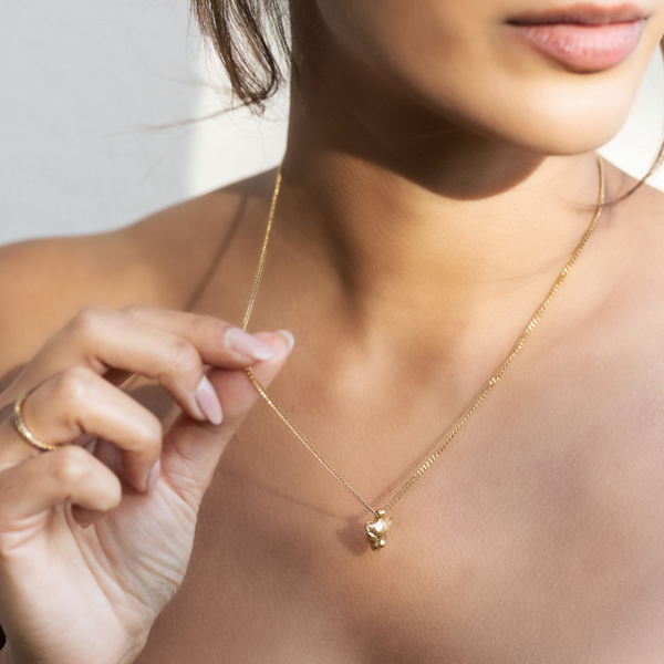 NIKITA 'I am Courageous' lioness pendant necklace for women with quality 18k gold plating and delicate chain. Ideal mother day gift or birthday gift for her.