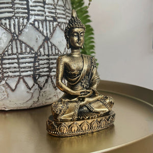 NIKITA oriental buddha statue, intricately designed in a meditating position to bring peace and positive energy into your home. A stylish buddha ornament to make the perfect gift for her.