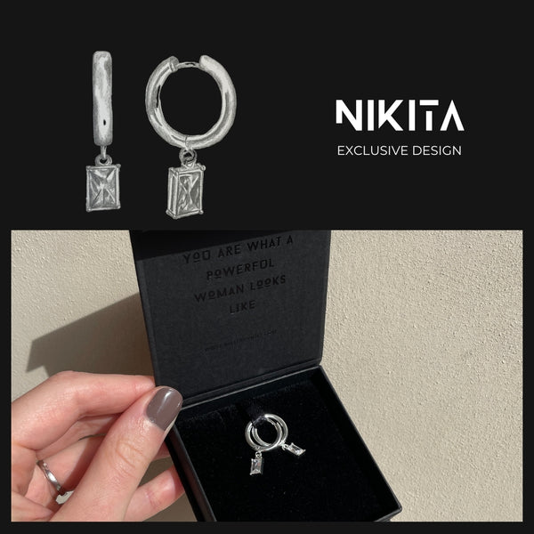 NIKITA clear quartz crystal pendant hoop earrings with an 18k gold plated finish. Small hoops for women made with a quality water-resistant, hypoallergenic stainless steel base. Christmas everyday jewellery gift for her.
