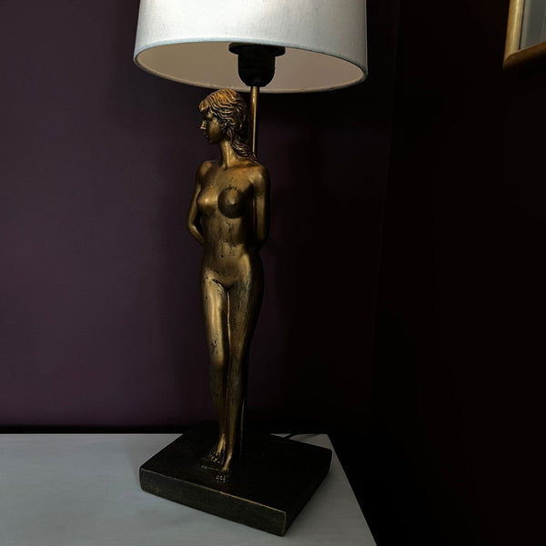 Luxury woman lamp, complete with cream lampshade. Antique style gold female figure table lamp.