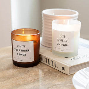 NIKITA Empowering white frosted glass candle, labelled 'Ignite your inner power'. Featuring a white jasmine scent. Christmas or birthday home decor gift for her.