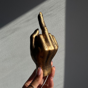 NIKITA gold brass middle finger ornament or ring holder. Fun and quirky home décor.