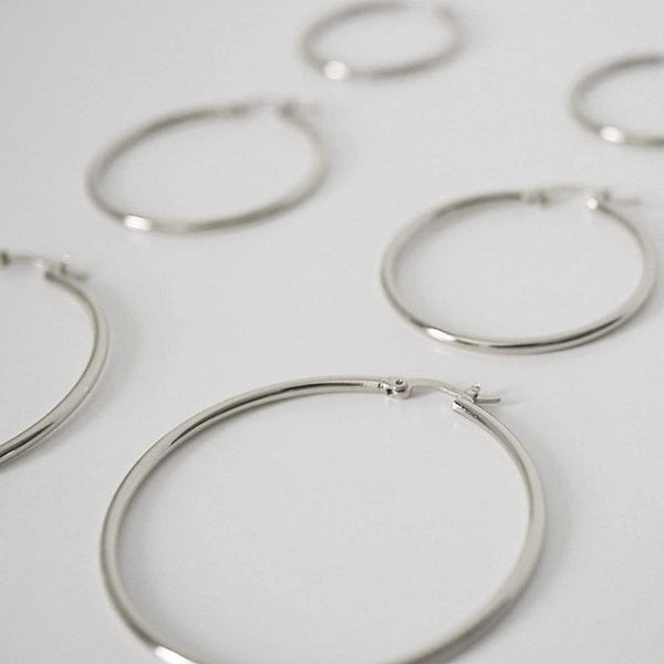 NIKITA classic, every day hoop earrings. Waterproof and hypoallergenic 18k plated hoops with a stainless steel base. Everyday jewellery gift for her.