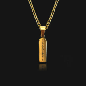 NIKITA fearless engraved bar pendant necklace. A waterproof gold charm and quality chain, with a hypoallergenic stainless steel base. Christmas everyday jewellery gift for her.