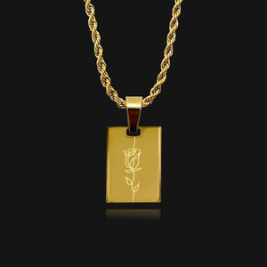 NIKITA rose engraved tag pendant necklace with a unique rose line drawing. A water-resistant pendant and adjustable twist chain made with a hypoallergenic stainless steel base. Christmas everyday jewellery gift for her.