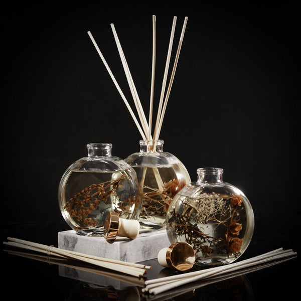 NIKITA botanical scented glass reed diffusers with dried flowers and floral scents, in red rose, lily rose and lavender. Christmas or birthday gift for her.