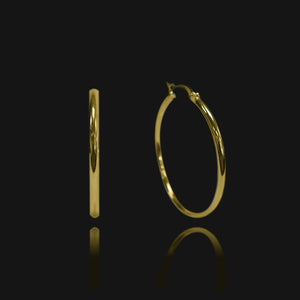 NIKITA classic, every day hoop earrings. Waterproof and hypoallergenic 18k plated hoops with a stainless steel base. Everyday jewellery gift for her.