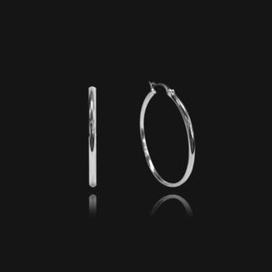 NIKITA classic, every day hoop earrings. Waterproof and hypoallergenic 18k plated hoops with a stainless steel base. Everyday jewellery gift for her.