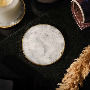 NIKITA natural crystal coaster set of 2 to use for mugs and glasses in your home. A coffee table accessory with a gold, silver or rose gold edge. Ideal christmas or new home gift for couples.