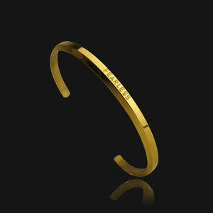 NIKITA 'Fearless' cuff, engraved adjustable bangle with waterproof 18k gold plating and a hypoallergenic stainless steel base. Christmas everyday jewellery gift for her.