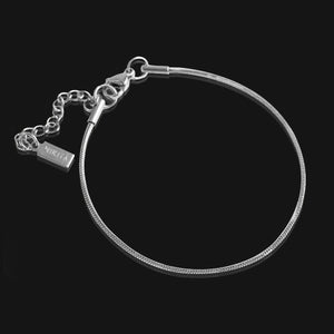 NIKITA - Dainty snake chain bracelet with adjustable sizing and a hypoallergenic stainless steel base. Christmas everyday jewellery gift for her.