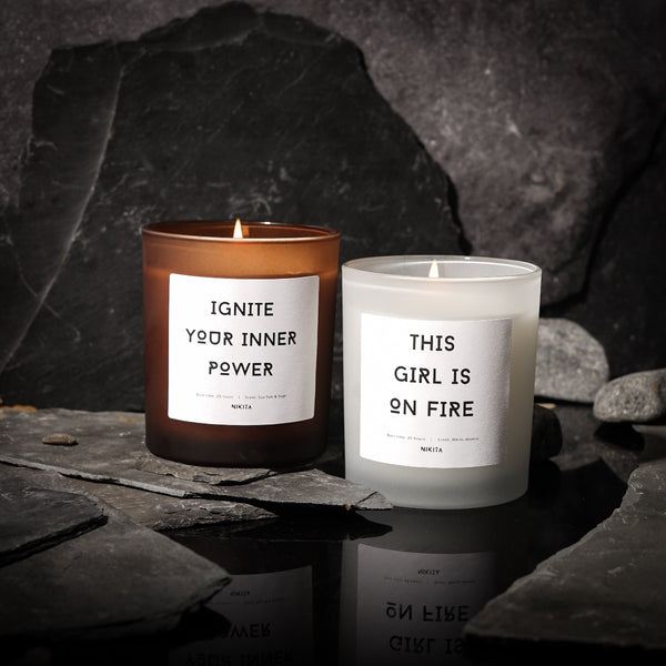 NIKITA Empowering white frosted glass candle, labelled 'Ignite your inner power'. Featuring a white jasmine scent. Christmas or birthday home decor gift for her.