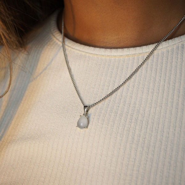 NIKITA natural moonstone pendant necklace with a unique precious stone teardrop design. A water-resistant silver pendant with adjustable chain made with a hypoallergenic stainless steel base. Christmas or Mother's Day everyday jewellery gift for her.