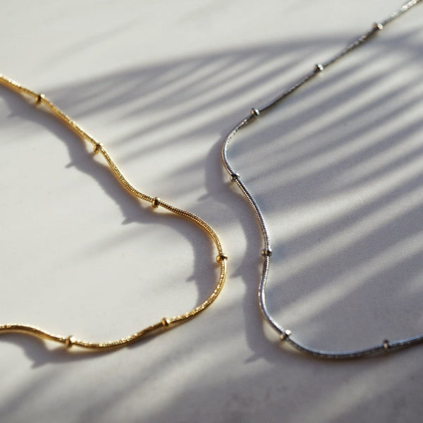 NIKITA interval beaded snake chain necklace. A waterproof 18k gold plated, quality chain, with a hypoallergenic stainless steel base. Every day jewellery gift for her.