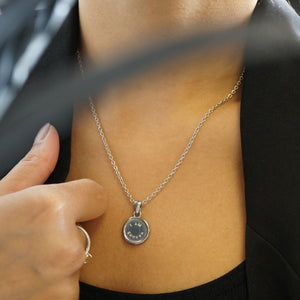 NIKITA 'I am Enough' engraved pendant necklace with a unique wax stamp inspired design. A water-resistant pendant and adjustable chain made with a hypoallergenic stainless steel base. Christmas everyday jewellery gift for her.