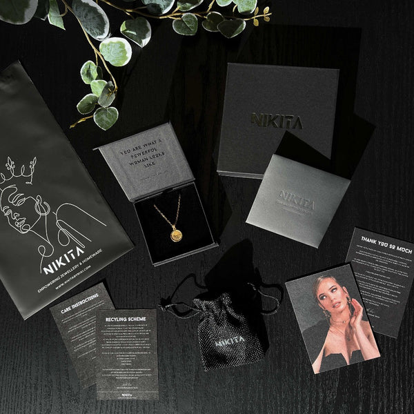 Luxury black branded, recyclable packaging for all NIKITA jewellery.