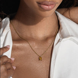 NIKITA citrine pendant necklace with a unique precious stone design and 18k plated gold finish. A water-resistant pendant and adjustable chain made with a hypoallergenic stainless steel base. Christmas everyday jewellery gift for her.