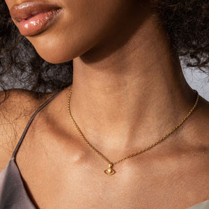NIKITA evil eye pendant necklace with a unique precious moonstone centre and 18k plated gold hammered finish. A water-resistant pendant and adjustable chain made with a hypoallergenic stainless steel base. Christmas everyday jewellery gift for her.
