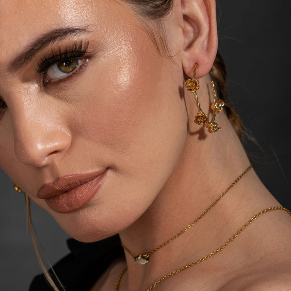 NIKITA twisted rose statement hoops earrings. Waterproof and hypoallergenic 18k plated hoops with a stainless steel base. Everyday jewellery gift for her.