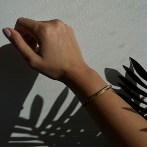 NIKITA 'I Am Enough' cuff, engraved adjustable bangle with waterproof 18k gold plating and a hypoallergenic stainless steel base. Christmas everyday jewellery gift for her.