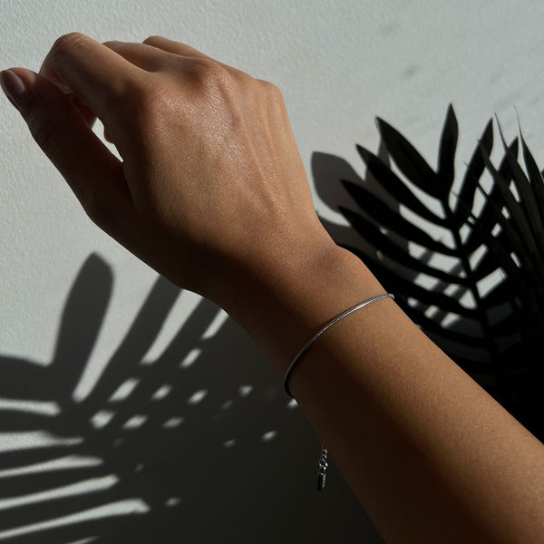 NIKITA - Dainty snake chain bracelet with adjustable sizing and a hypoallergenic stainless steel base. Christmas everyday jewellery gift for her.