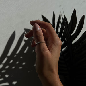 NIKITA Tala minimal ring with plaited design, to wear on your thumb or finger. Waterproof and hypoallergenic stainless steel base. Christmas everyday jewellery gift for her.