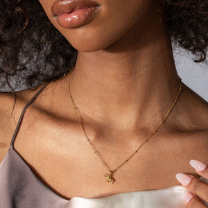 NIKITA elephant pendant necklace with a unique, baby elephant 3D design. A water-resistant 18k gold plated pendant and adjustable chain made with a hypoallergenic stainless steel base. Christmas everyday jewellery gift for her.