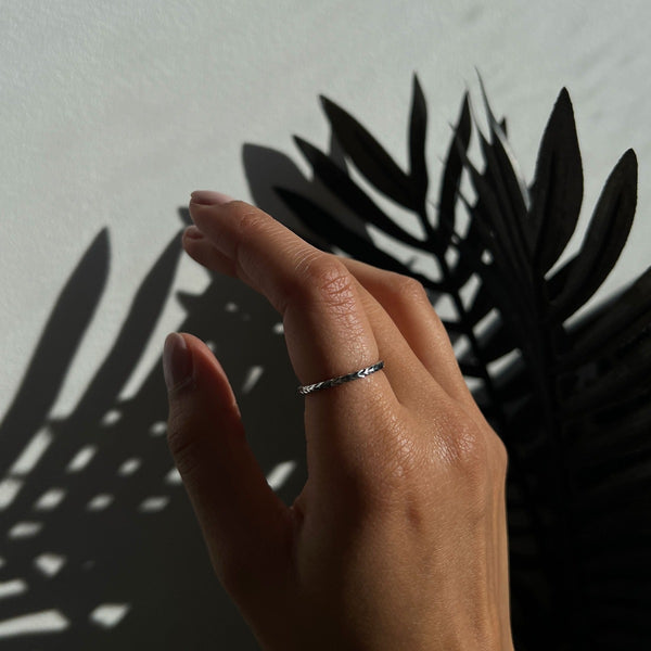 NIKITA Tala minimal ring with plaited design, to wear on your thumb or finger. Waterproof and hypoallergenic stainless steel base. Christmas everyday jewellery gift for her.