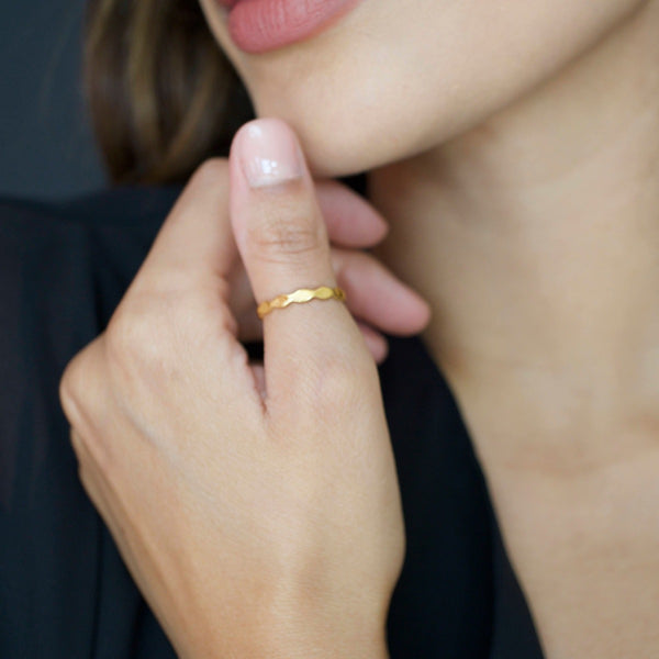NIKITA river minimal ring with ripple design, to wear on your thumb or finger. Waterproof 18k gold plating and a hypoallergenic stainless steel base. Christmas everyday jewellery gift for her.