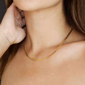 NIKITA flat snake chain necklace. A waterproof, 18k gold plated quality chain, with a hypoallergenic stainless steel base. Every day jewellery gift for her.