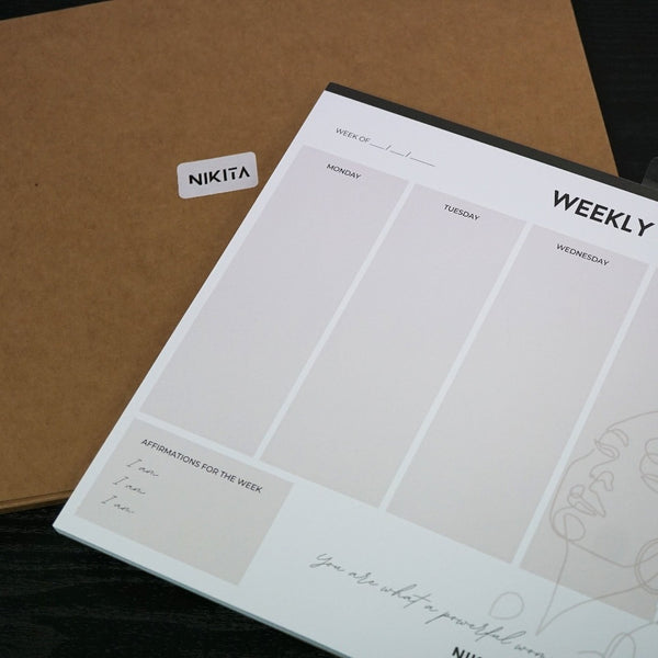 NIKITA weekly planner desk or tear-off wall pad, undated calendar to complete daily tasking, affirmations and notes. Arrives in a recyclable, branded envelope ready to gift. 