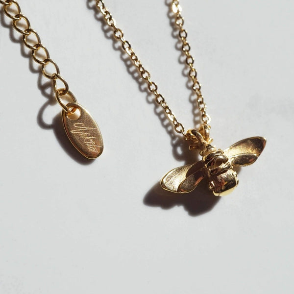 NIKITA bumble bee pendant necklace with a unique, intricate design and an 18k plated gold finish. A water-resistant pendant and adjustable chain made with a hypoallergenic stainless steel base. Christmas everyday jewellery gift for her.