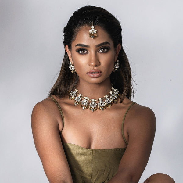 NIKITA leilani rhinestone encrusted statement choker and earrings set with an antique gold plated finish. A chunky design made with a hypoallergenic stainless steel base. Christmas everyday jewellery gift for her.